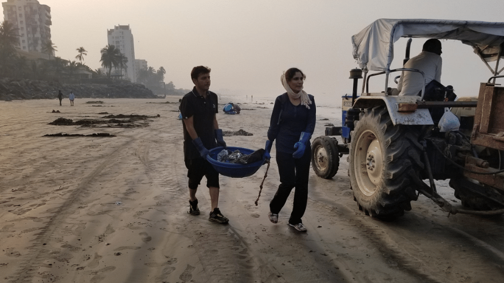 Volunteers help out with the beach clean-up drive in the 109th week.&nbsp;