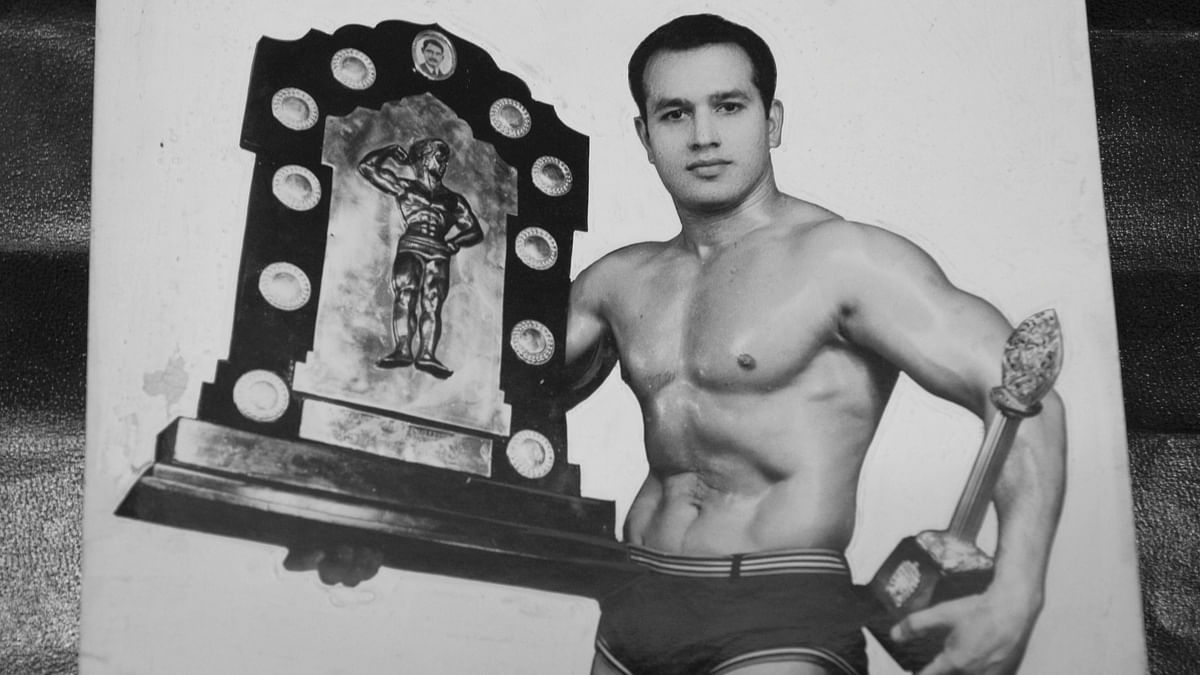 MM Khan, who won the Mr India title in 1970, with his trophy.