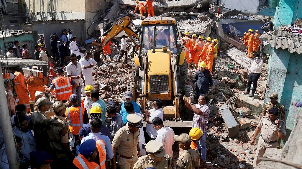 Rescue work  underway after a four-storey building collapse in Bhiwandi, Thane, near Mumbai on Friday.