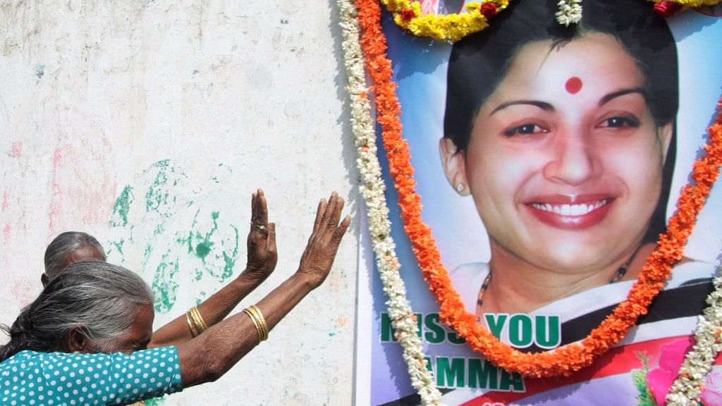 A file photo of people paying tribute to former Tamil Nadu Chief Minister J Jayalalithaa who died at Chennai’s Apollo Hospital.