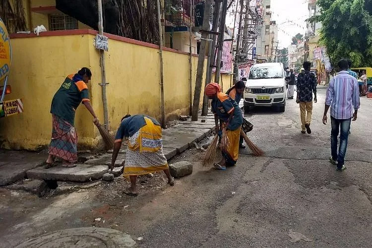 The biometric system for pourakarmikas has led to confusion among councilors and garbage contractors.