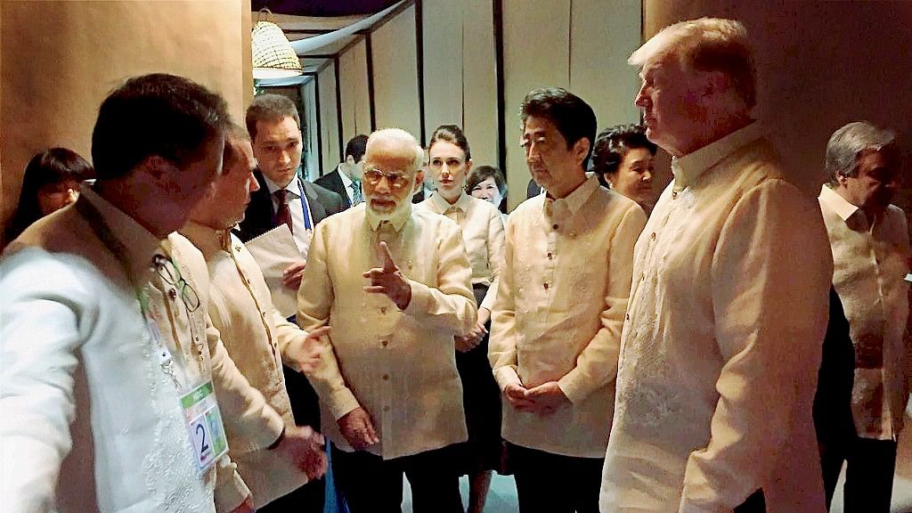 PM Modi with Donald Trump and Shinzo Abe at the ASEAN Summit dinner in Manila.
