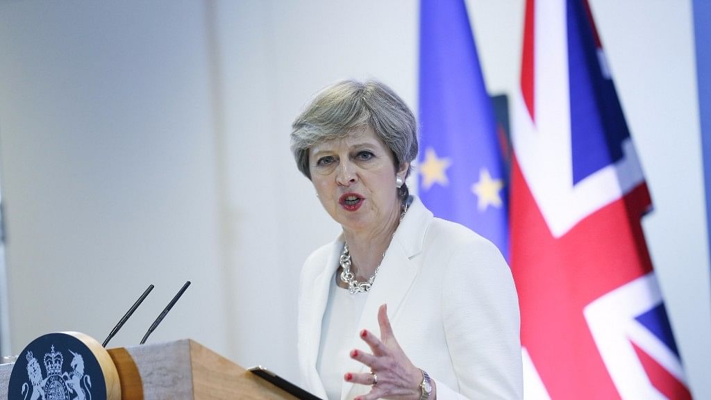 British Prime Minister Theresa May attends a press conference at the end of a two-day EU Summit in Brussels.