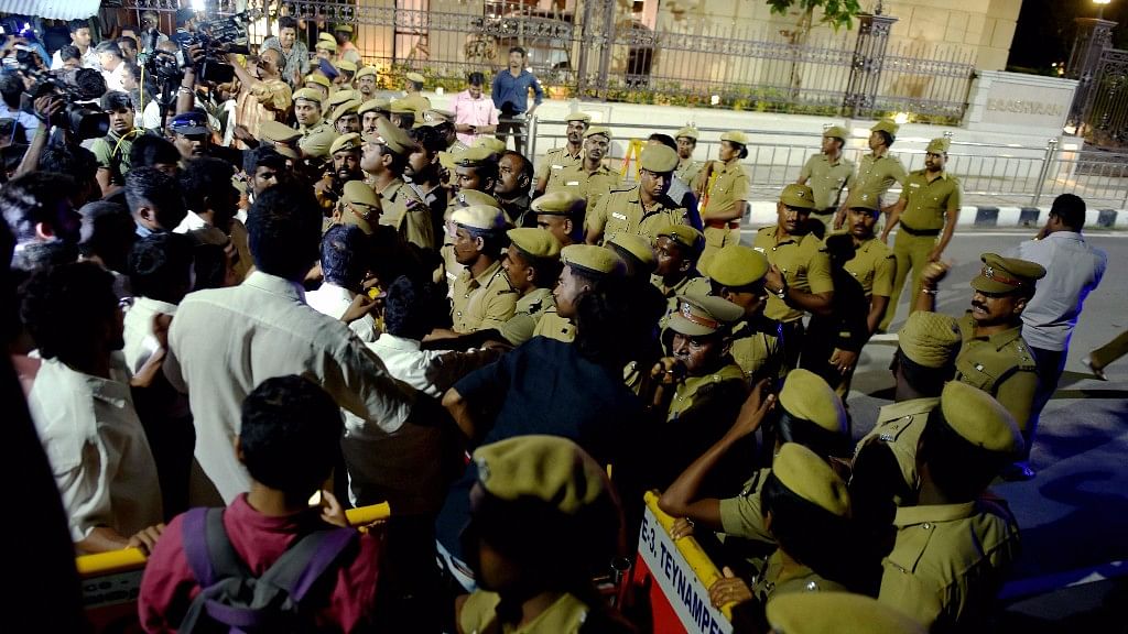 Police and media personnel outside late Tamil Nadu CM J Jayalalithaa’s residence at Poes Garden, where the I-T Department conducted raids on the night of 17 November.&nbsp;