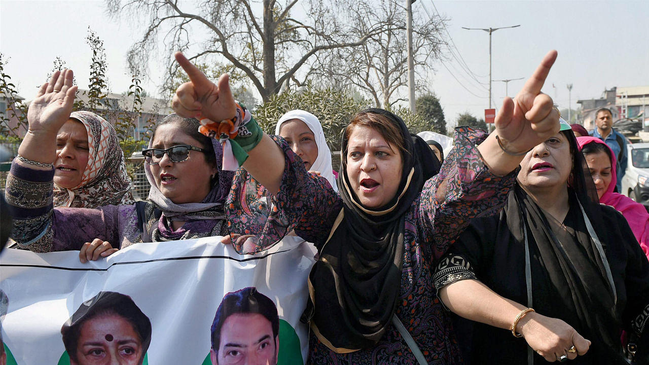 Women protest against braid chopping incidents in Srinagar.