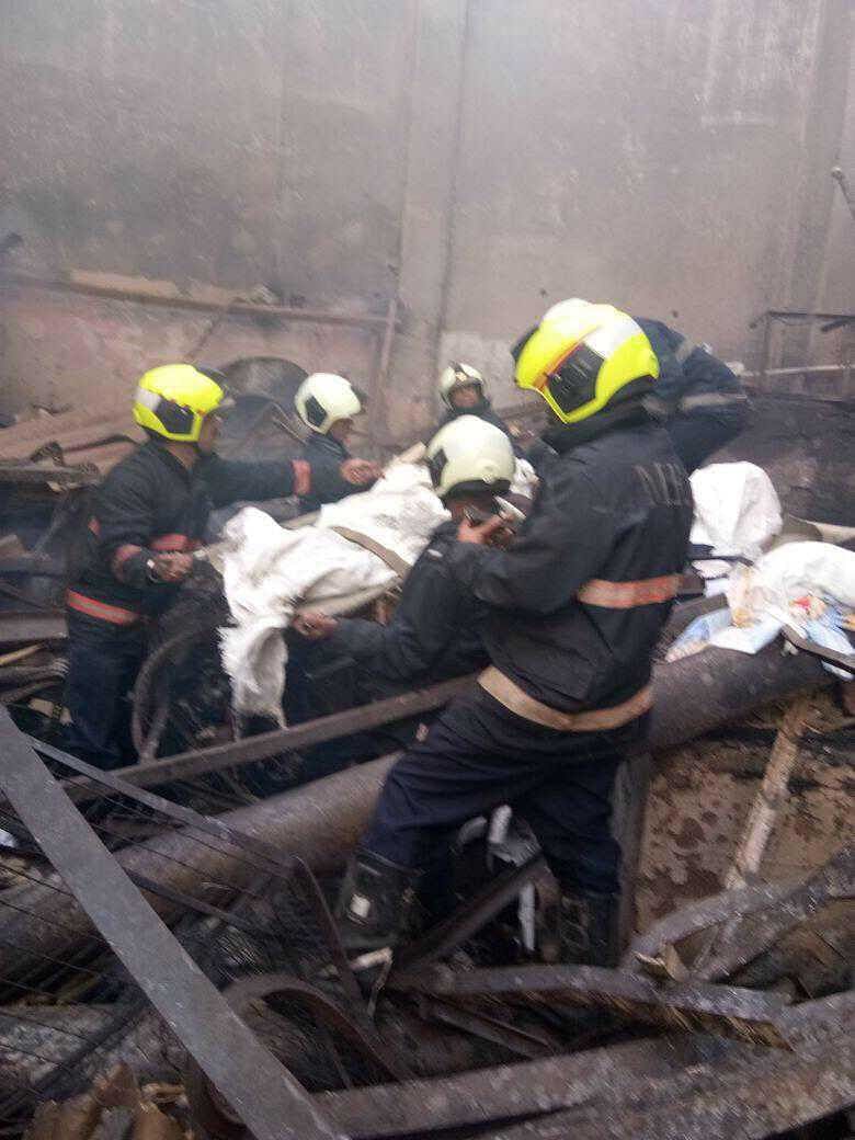The fire that started in the accused’s shop killed 12 persons in the building.