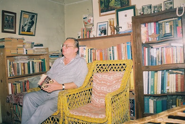 <p>An old photograph of Ruskin Bond in his home in the hills.</p>