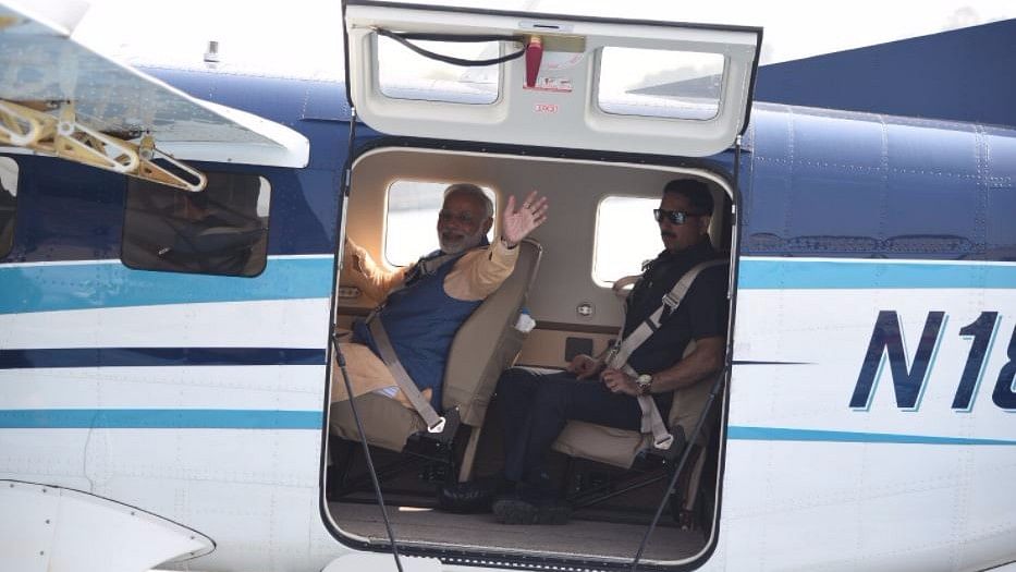 PM Modi onboard the seaplane on Tuesday, 12 December.