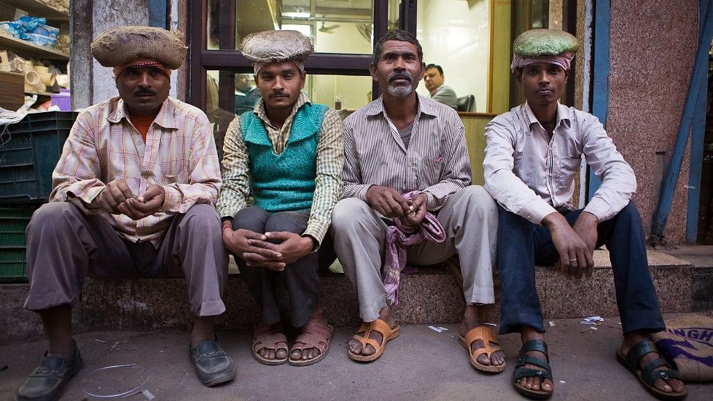 Jhalliwalas of Chawri Bazar, Old Delhi waiting for work in the evening. (L-R: Mahender, Brij Kishore,  Dharbhari and Amit)