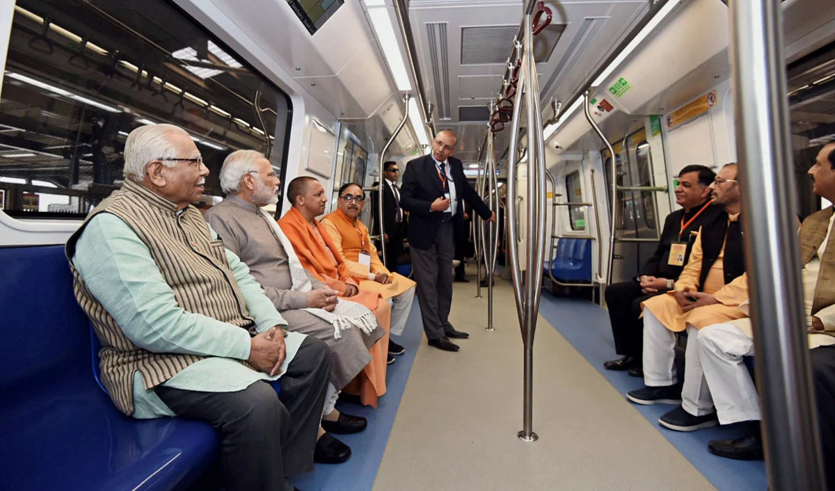 Prime Minister Narendra Modi rides the Magenta Line with UP CM Yogi Adityanath.