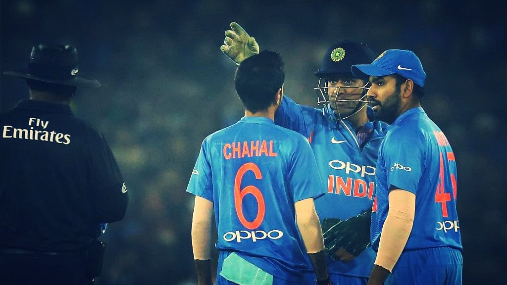 MS Dhoni with Yuzvendra Chahal of India and Rohit Sharma Captain of India during the first International T20 match (T20i) held at the the Barabati Stadium, Cuttack between India and Sri Lanka on the 20th December 2017&nbsp;
