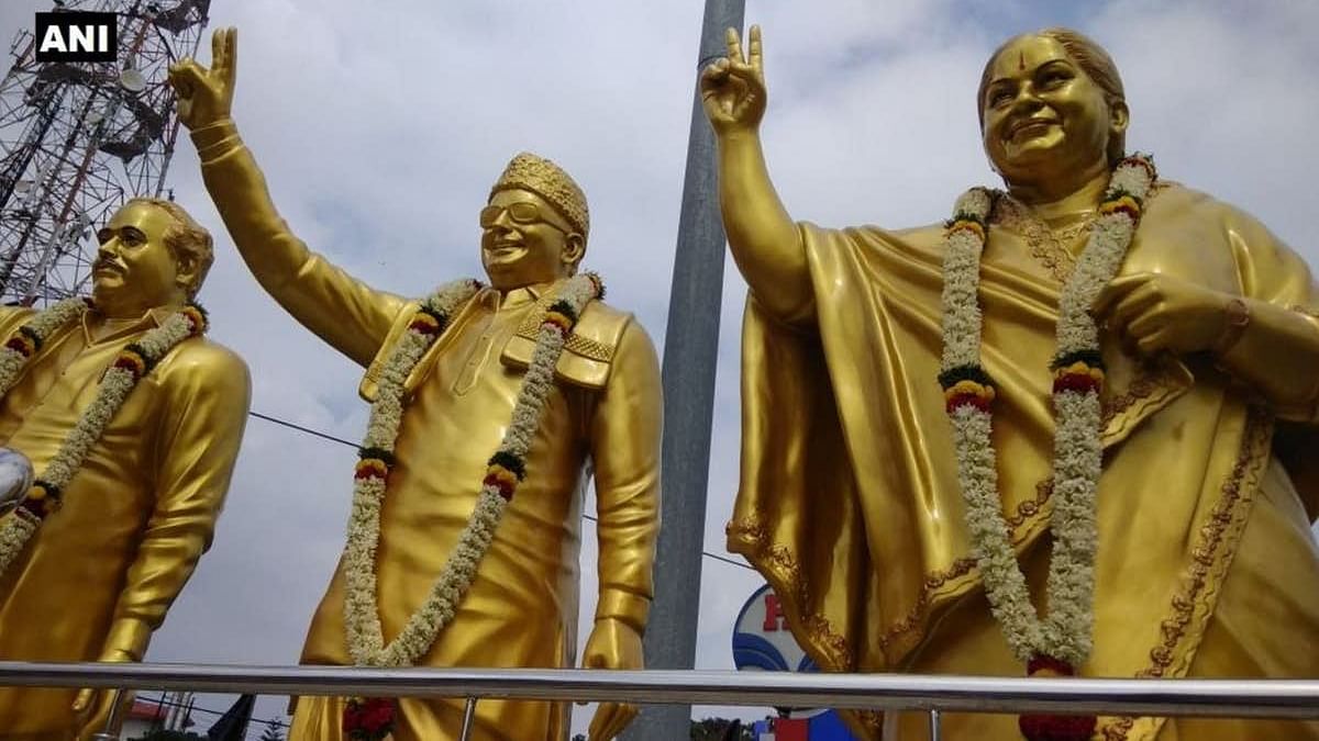 Cadres pay tribute to late Chief Minister Jayalalithaa’s golden statue in Coimbatore.