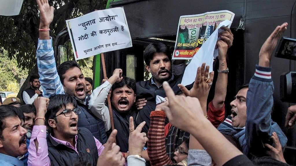 Congress workers picket outside the Election Commission’s office in New Delhi. &nbsp;