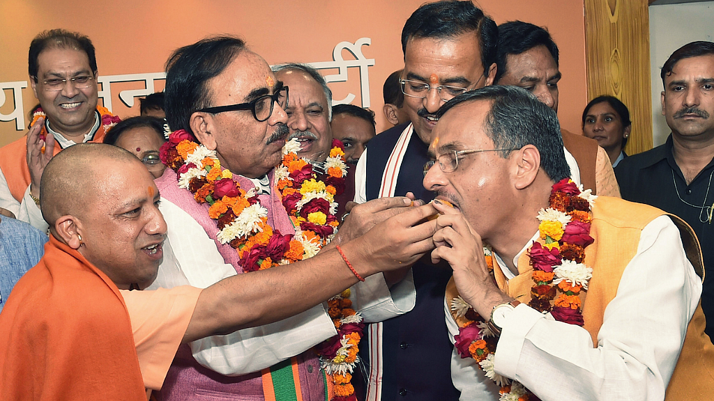 Yogi Adityanath and his ministers celebrate their UP civic polls win on 1 December.