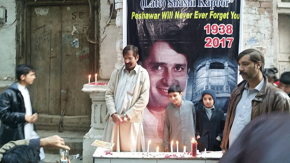 A candle vigil outside Shashi Kapoor’s ancestral home in Peshawar.