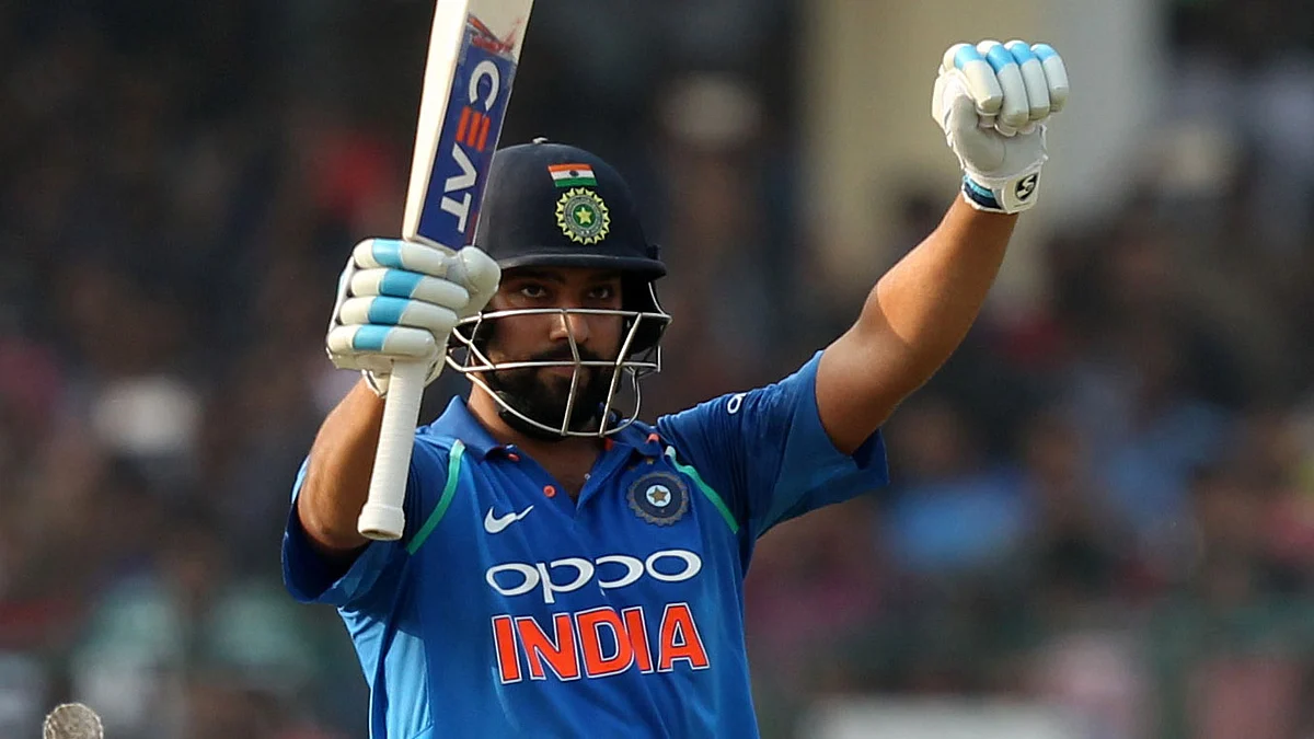 Rohit Sharma celebrates a century.