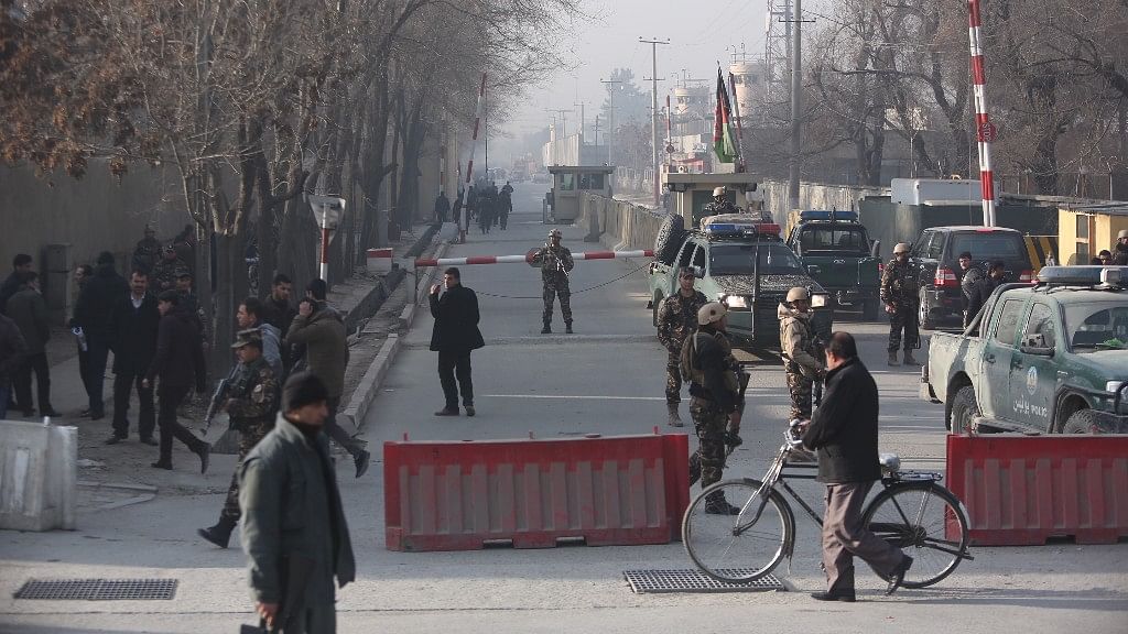 Afghan security personnel arrive at the site of suicide attack in Kabul, Afghanistan on Monday, 25 December.&nbsp;