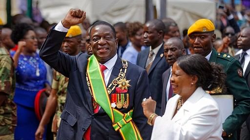 File photo of Zimbabwe’s President Emmerson Mnangagwa (center), and his wife Auxillia (right)