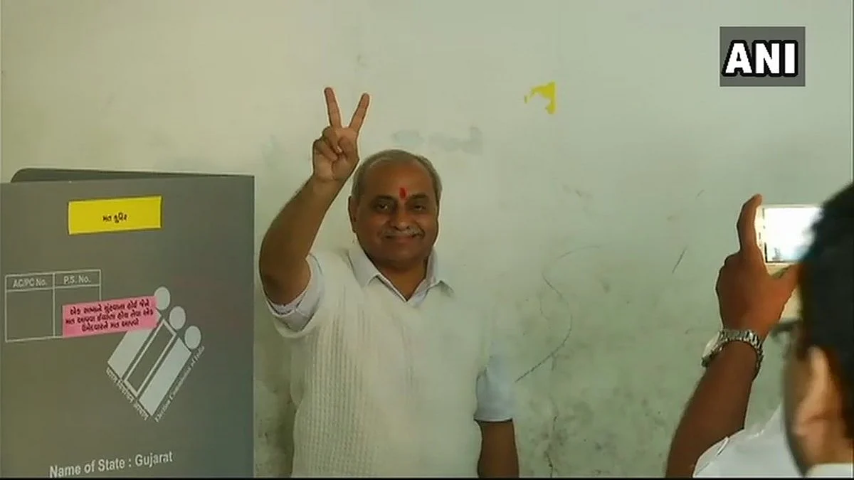 Deputy Chief Minister Nitin Patel casts his vote in Kadi, Mehsana.