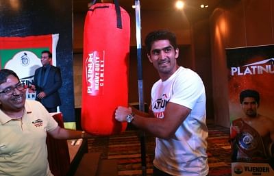 New Delhi: Boxer Vijender Singh along with Udaipur Cement Works Director Shailendra Chouksey during the announcement of Platinum Heavy Duty Cement