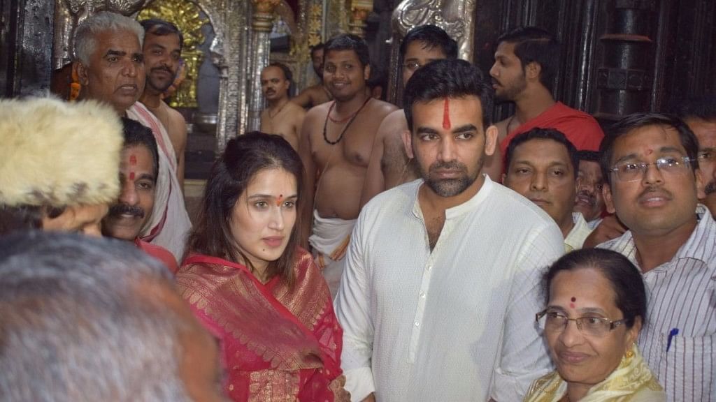 Sagarika Ghatge and Zaheer Khan at the temple.&nbsp;