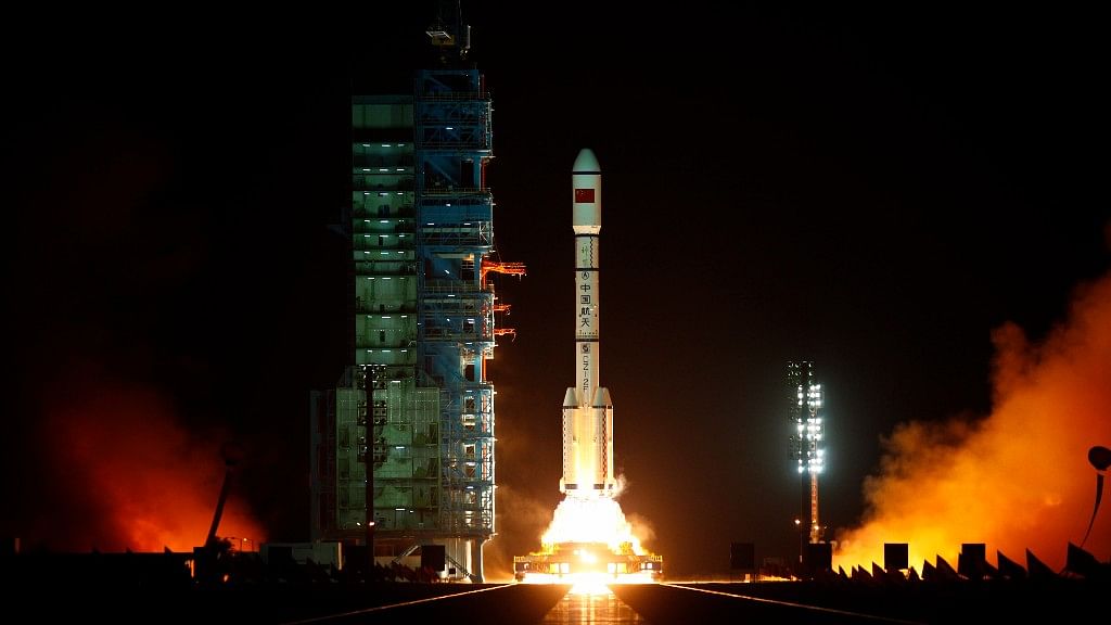 September 2011: Long March II-F rocket loaded with China’s unmanned space module Tiangong-1 lifts off from the launchpad.