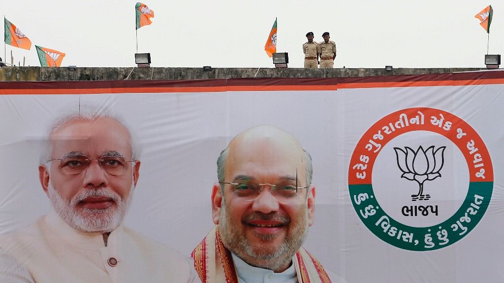 A hoarding of PM Narendra Modi and BJP chief Amit Shah in at  election campaign rally at Surendranagar in Gujarat on 3 December 2017.