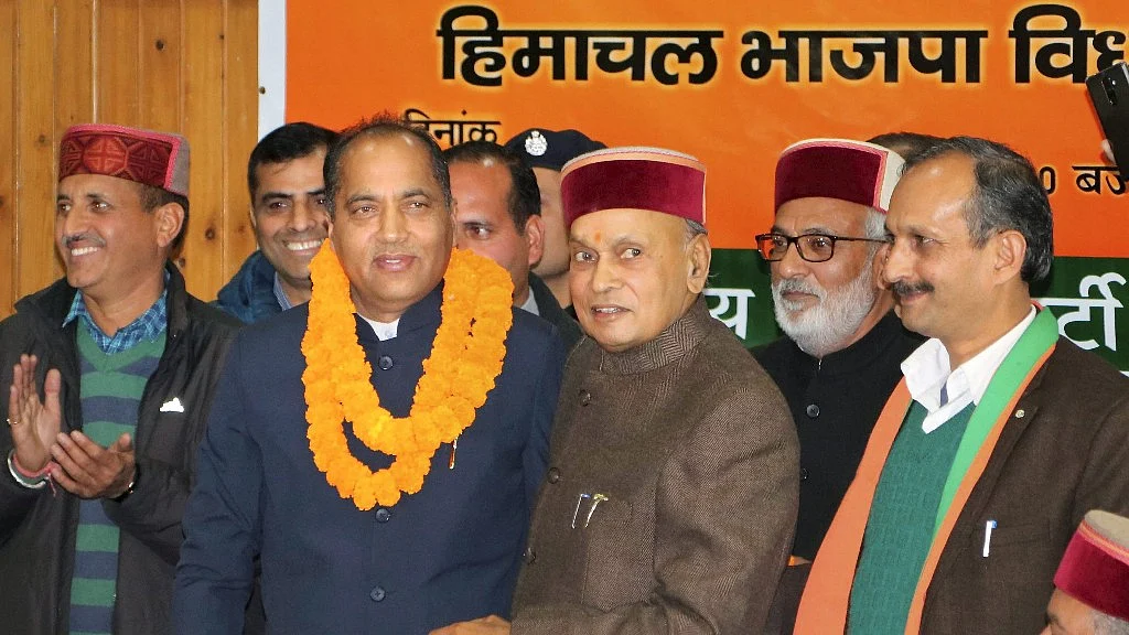 Jairam Thakur with Prem Kumar Dhumal.
