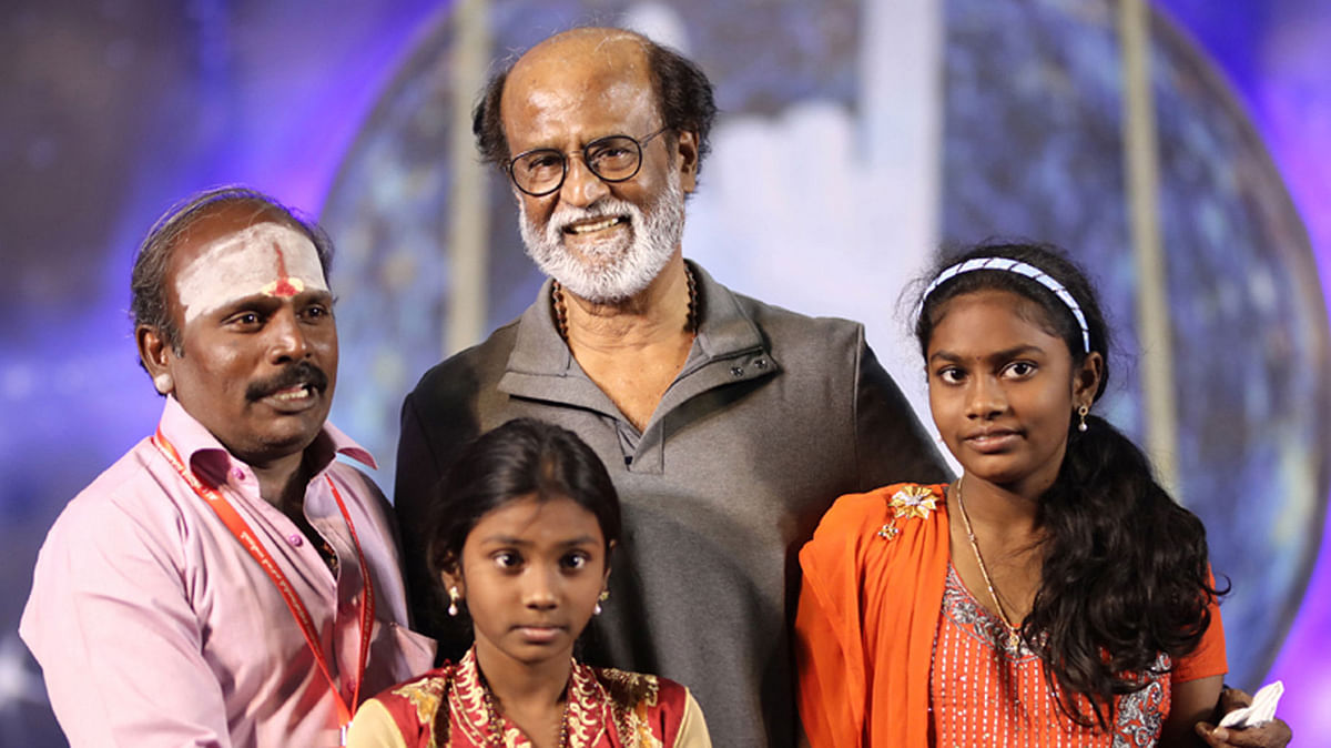Thalaiva with a family of fans.