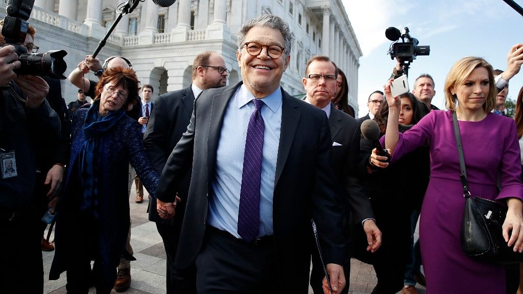 Senator Al Franken with his wife Franni Bryson, as he leaves the Capitol in Washington, after speaking on the US Senate floor on Thursday, 7 December 2017.