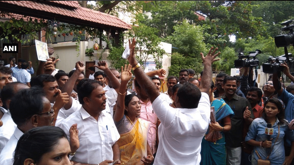 TTV Dhinakaran’s supporters celebrate his early lead in the RK Nagar bypolls.&nbsp;