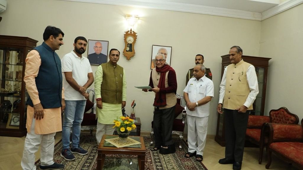 CM Vijay Rupani and Dy CM Nitin Patel with Gujarat Governor OP Kohli