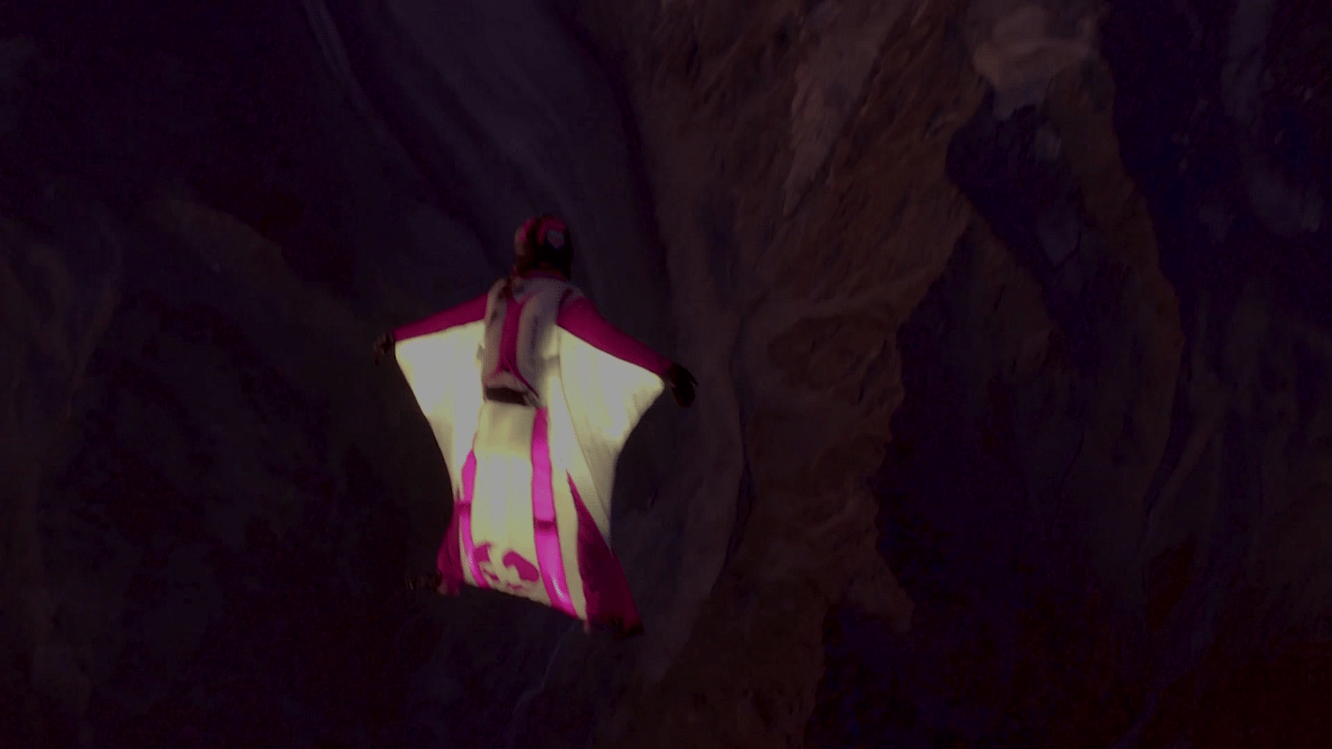 Geraldine Fasnacht paragliding wearing a lit up suit from 18000 feet