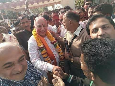 BJP’s Babu Bokhiria is greeted by supporters.