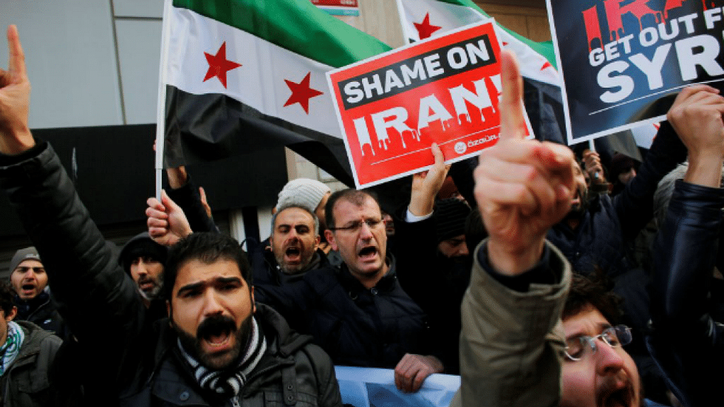 Demonstrators shout slogans during a protest against Iran’s role in Aleppo, near the Iranian Consulate in Istanbul, Turkey.&nbsp;