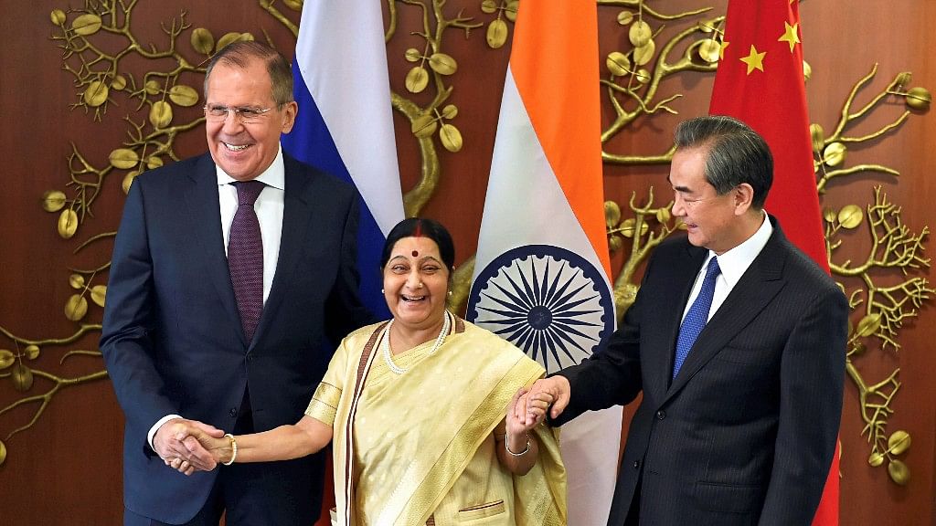 Sushma Swaraj with the Chinese and Russian foreign ministers Wang Yi and Sergey Lavrov respectively.&nbsp;