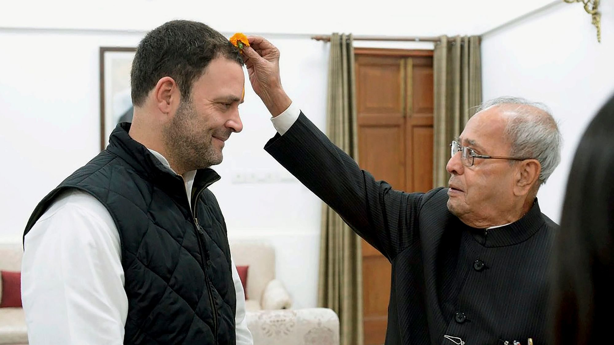 File image of Rahul Gandhi being greeted by former president Pranab Mukherjee before he filed his nomination papers for party president’s post, in New Delhi.