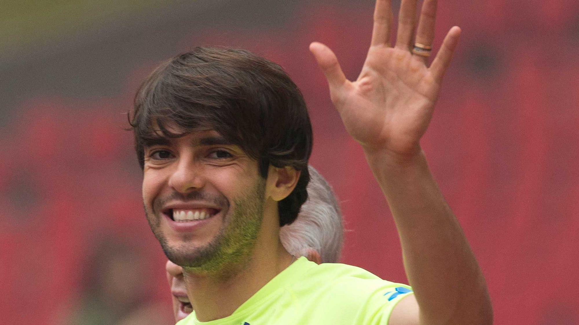 Brazil’s Kaka waves as he arrives for a training session ahead of a friendly match against Argentina at the Bird’s Nest National Stadium in Beijing, China. Former Ballon d’Or winner Kaka says he is retiring from soccer at age 35.<a></a>