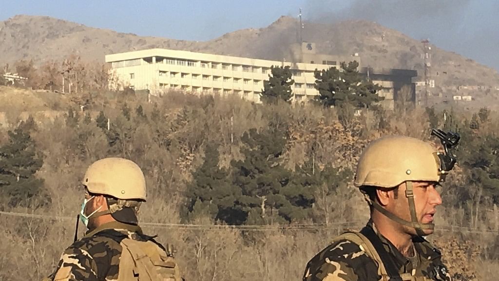 Smoke rises from the Intercontinental Hotel after an attack in Kabul, Afghanistan.