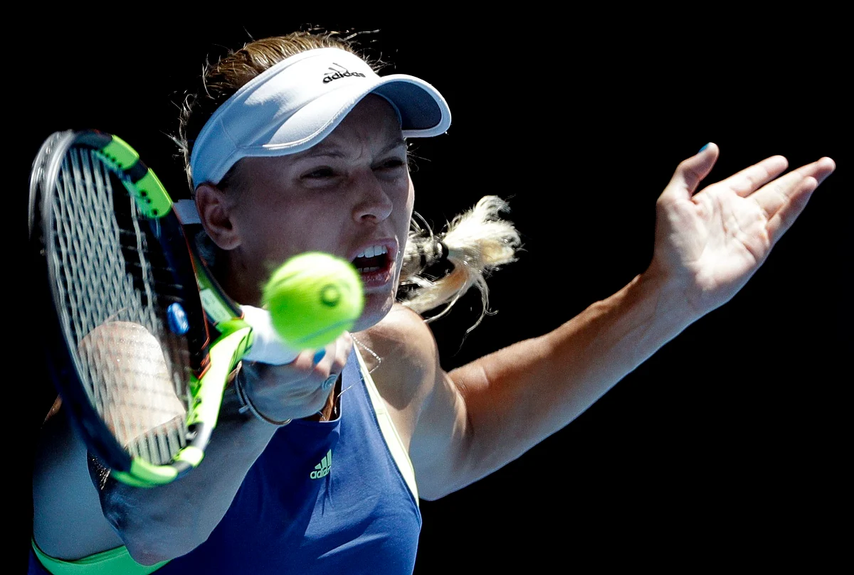Caroline Wozniacki came through a late bout of nerves to reach the Australian Open final for a first time.
