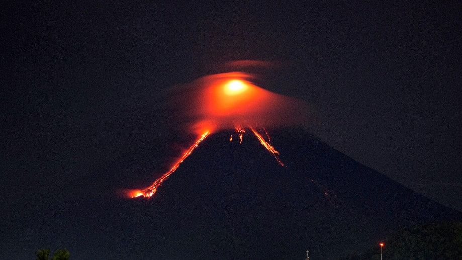 In Pics: Glowing Red Lava Rolls Down Slopes of Philippine Volcano