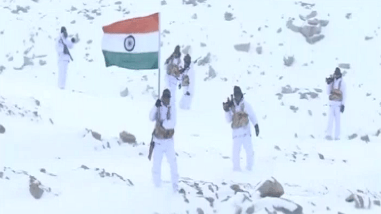 The officials hoisted the flag 18,000 feet above ground level at a temperature of -30 degrees celsius.