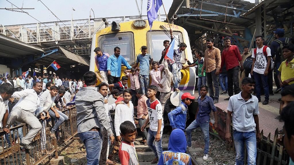  Dalit groups protesting at Thane railway station during the Maharashtra Bandh on 3 January following clashes between two groups in Bhima Koregaon near Pune.