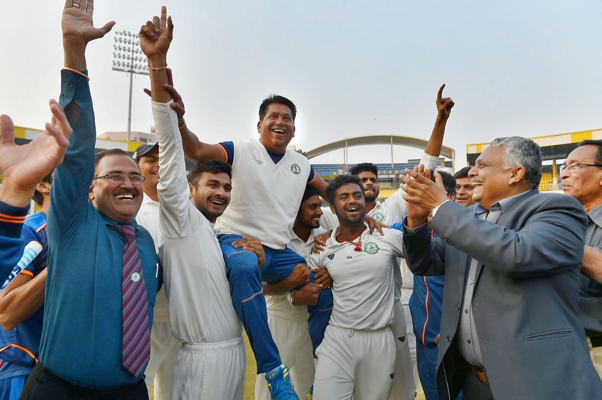 Vidarbha clinched their maiden Ranji Trophy cricket title, crushing Delhi by nine wickets in Indore.
