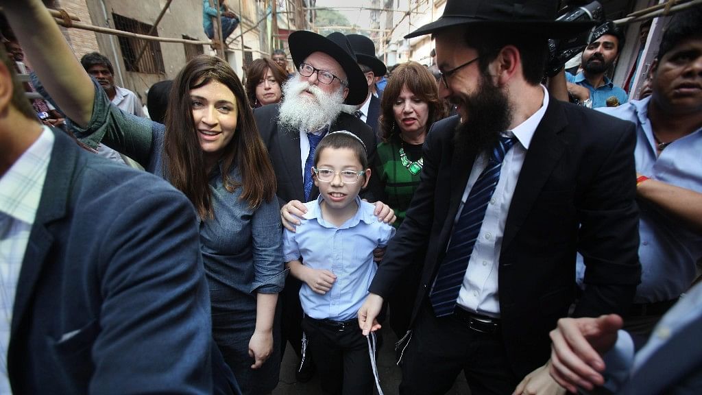 Israeli boy Moshe Holtzberg, who lost his parents during the 26/11 Mumbai terror attacks, arrives at Nariman House in Colaba, in Mumbai on Tuesday.