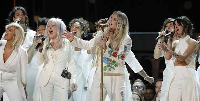 GRAMMYs support Time’s Up movement with white roses, and other stories.