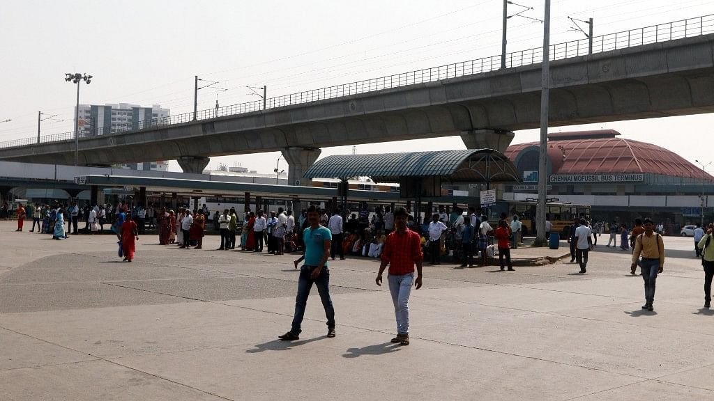 Commuters stranded at a bus depot as bus services are curtailed due to a strike called by crew members belonging to employees unions on disagreement to wage accord in Chennai.