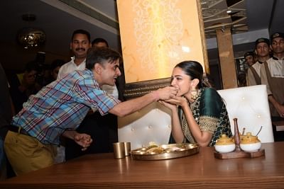 Mumbai: Actress Deepika Padukone feasts over a Rajasthani thali in an attemt to celebrate the success of her recently released film "Padmaavat"; at Maharaja Bhog in Mumbai on Jan 27, 2018.  Sanjay Leela Bhansali directorial has raked in Rs 56 crore (nearly $9 million) net in India in three days. (Photo: IANS)
