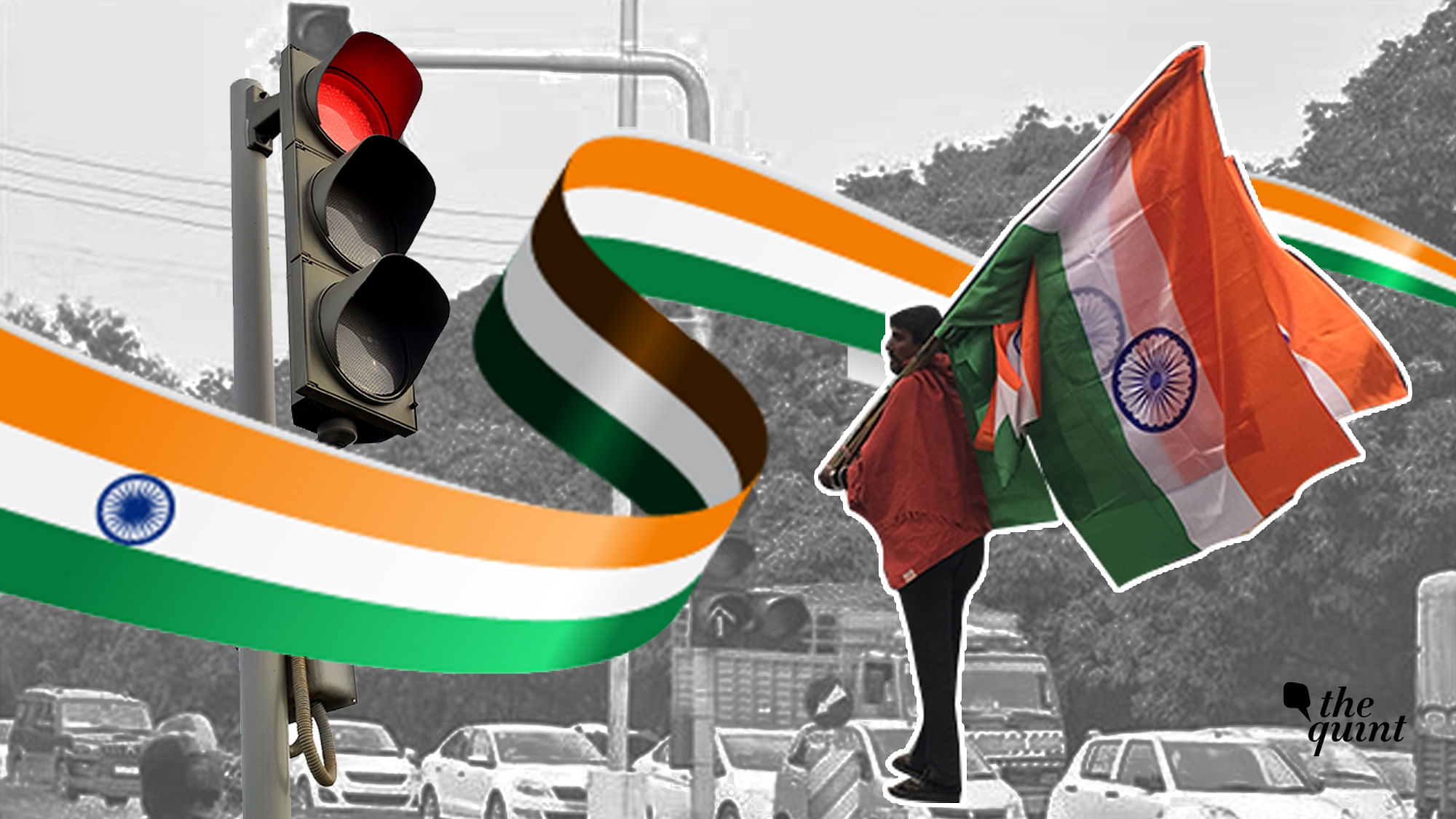 Wrapped in a thin red shawl, Kailash sells Indian flags at the Moolchand traffic signal.