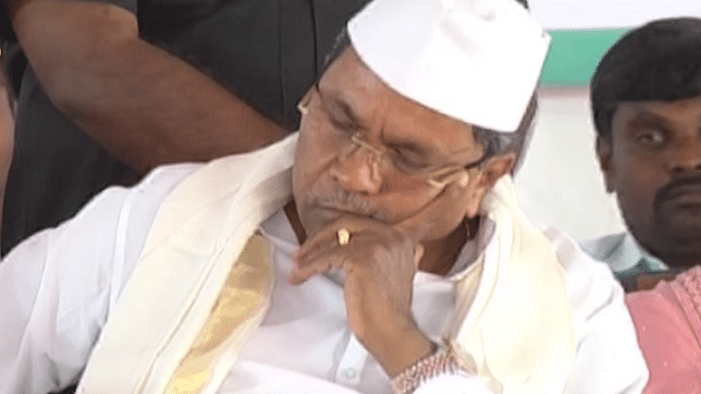 Karnataka CM Siddaramaiah was seen sleeping at a public event.
